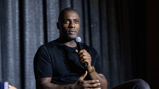 We cannot <i>wait</i> to watch kitty cat Idris Elba crawl around the <i>Cats </i>movie's gigantic, human-cat-scale sets